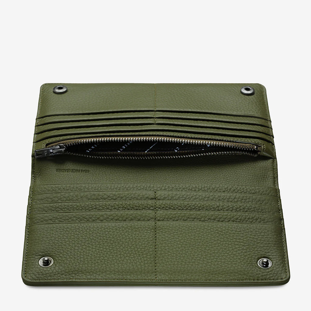Status Anxiety Living Proof Khaki